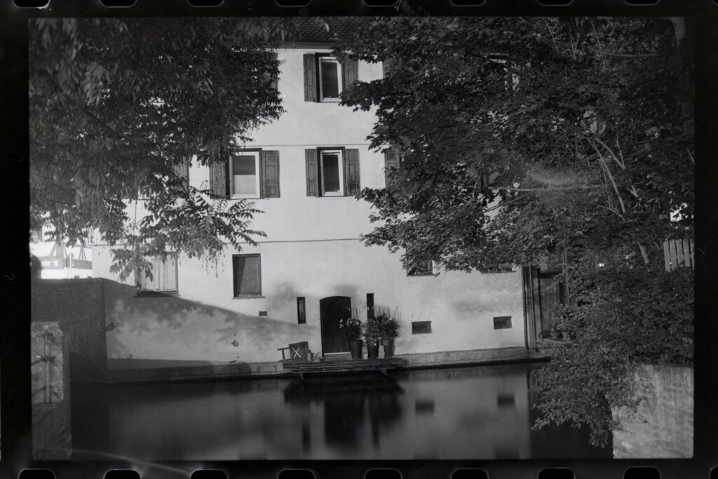 Historic building by a calm water