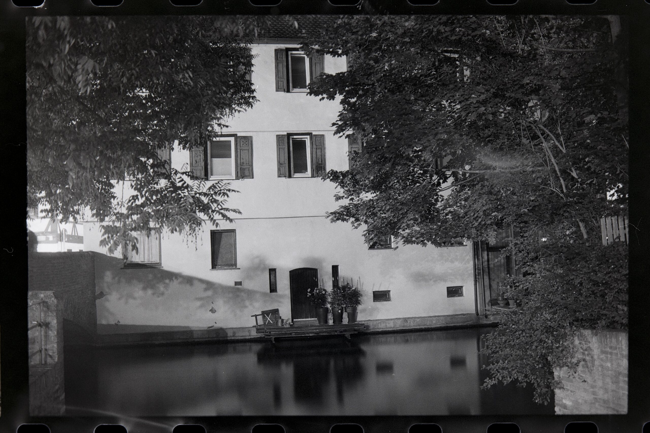 Historic building by a calm water